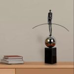 BALANCED MAN METAL ARTEFACTS