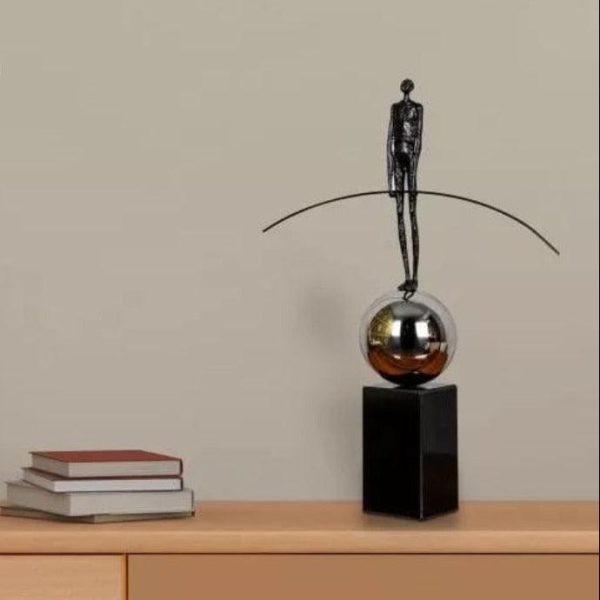 BALANCED MAN METAL ARTEFACTS